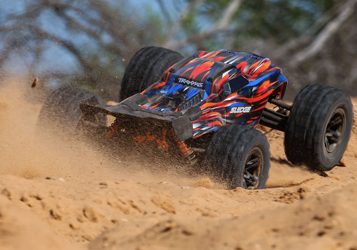 Traxxas Sledge RTR 6S 4WD Brushless 1/8 Monster Truck Orange με Belted Sledgehammer Tires, TQi & TSM